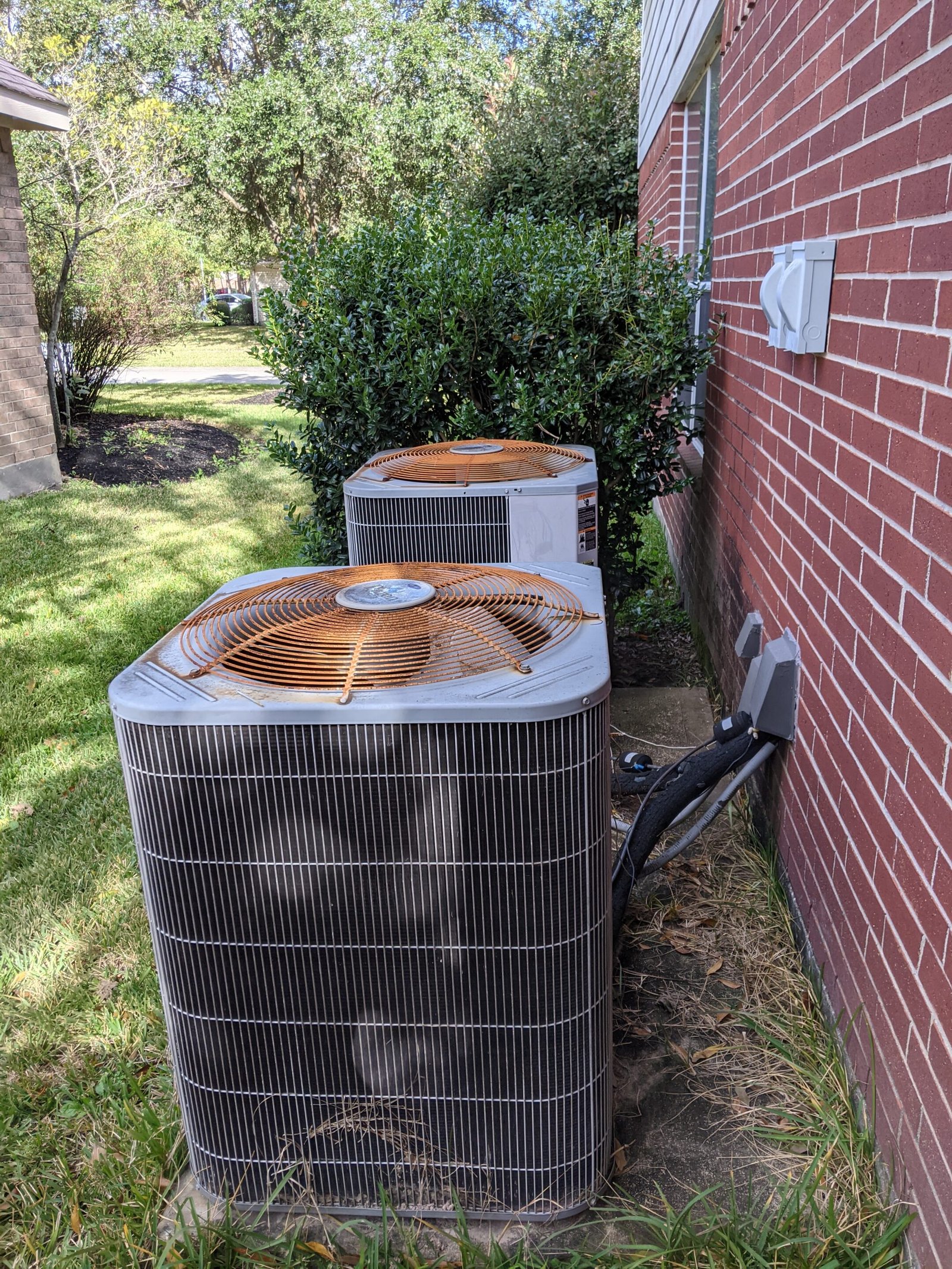 2 old condenser units being replaced at cypress tx