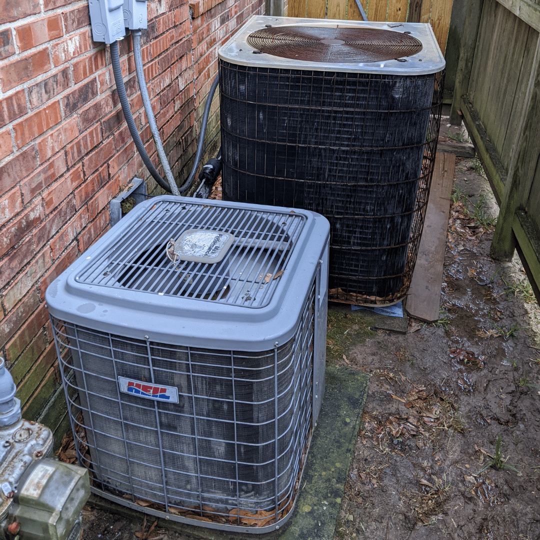 Two air conditioning units outside