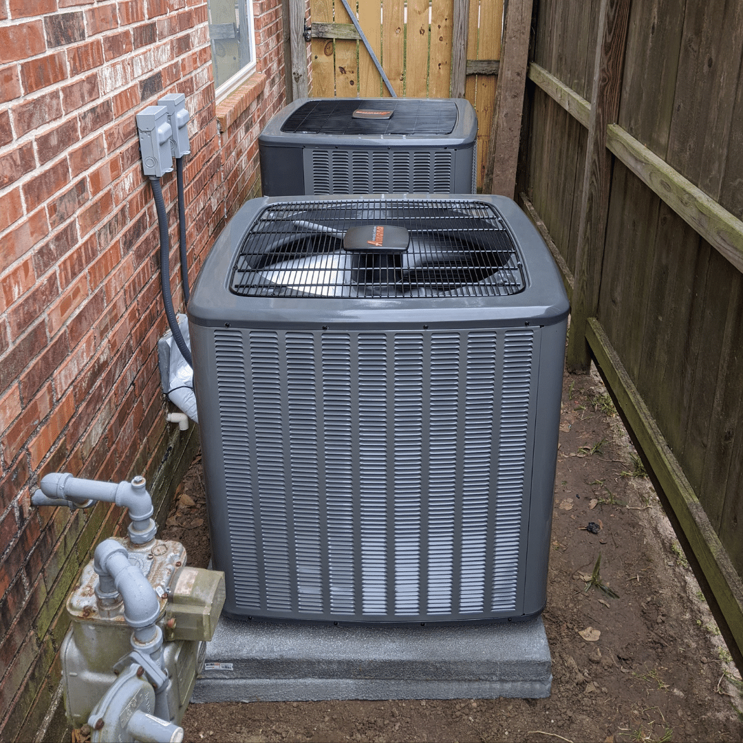 Two air conditioning units outside