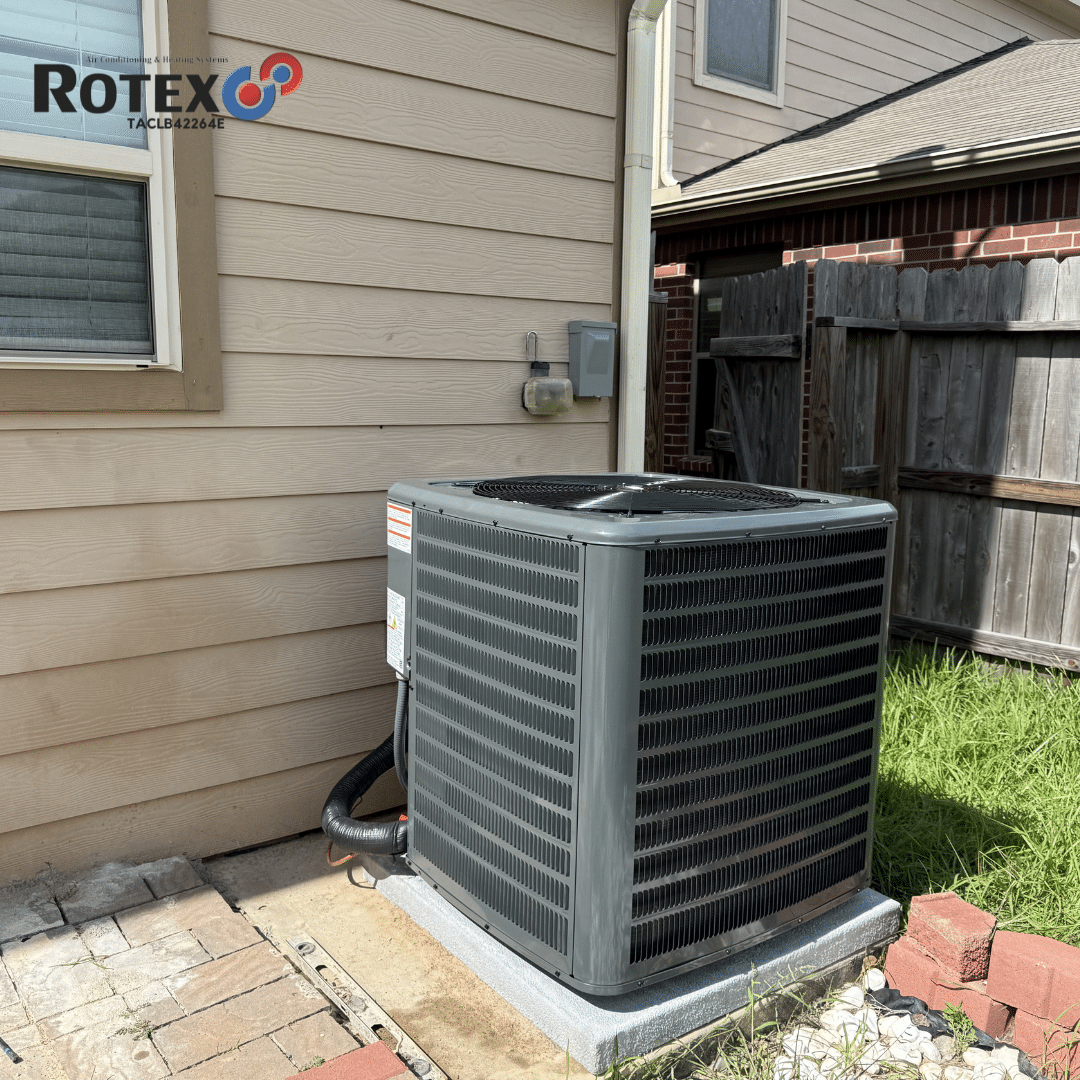 Air conditioning unit beside house